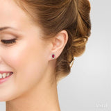 5x3 MM Pear Shape Ruby and 1/8 Ctw Single Cut Diamond Halo Precious Stud Earrings in 10K Yellow Gold