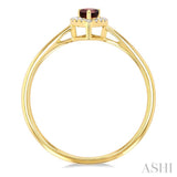 5x3 MM Pear Shape Garnet and 1/20 Ctw Single Cut Diamond Halo Semi-Precious Ring in 10K Yellow Gold