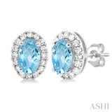 5x3 MM Oval Shape Aquamarine and 1/8 Ctw Single Cut Diamond Halo Semi-Precious Stud Earrings in 14K White Gold
