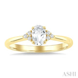 1/20 Ctw Oval Cut 6X4 MM White Topaz and Round Cut Diamond semi-precious Ring in 10K Yellow Gold