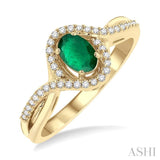 6x4 MM Oval Cut Emerald and 1/6 Ctw Split Criss-Cross Bypass Shank Round Cut Diamond Precious Ring with Center Stone in 10K Yellow Gold