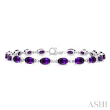 6X4 MM Oval Cut Amethyst and 1/6 Ctw Round Cut Diamond Semi-Precious Tennis Bracelet in 10K White Gold
